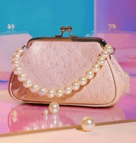 不莱玫音乐家花料珍珠链条口金包 感兴趣的话...