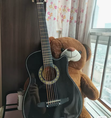 因异地搬家，出吉他一把，200包本人带教学...