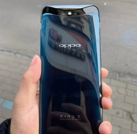 买给妹妹买的的OPPO Find X直面屏...