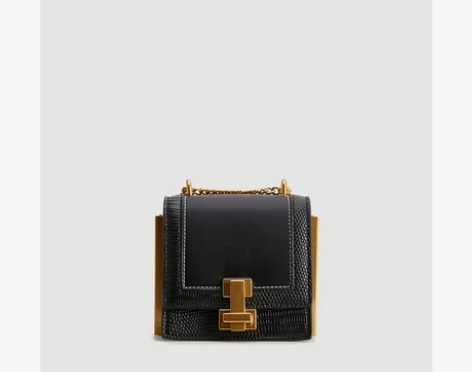 URBAN REVIVO春夏女士配饰锁扣斜...