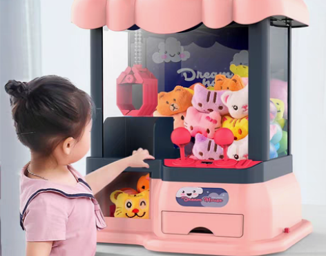 转卖网红抓娃娃机小型儿童家用迷你夹公仔女孩...