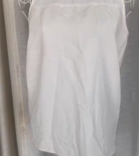 拼接设计感无袖雪纺上衣,白色微透适合搭浅色...