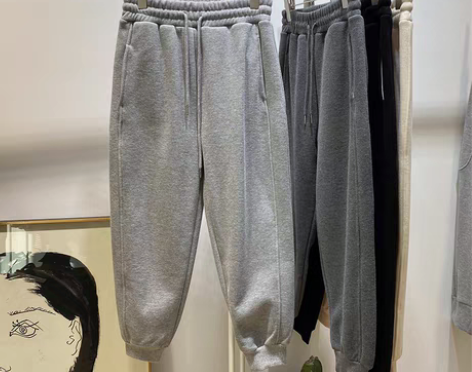 转卖冬季韩版简约松紧高腰系带拼接针织休闲裤...