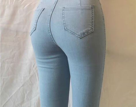 转卖欧美风高腰蜜桃臀基础弹力浅蓝牛仔长裤女...