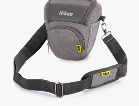 包邮尼康相机包微单便携文艺三角包D7500...