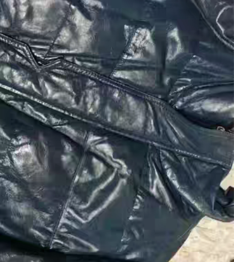 包邮啄木鸟正品绵羊皮羽绒服男，立领，99新...