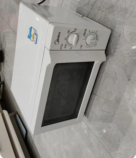 九成新美的微波炉，因闲置，处理给有需要的人...