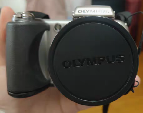 奥林巴斯微单 具体型号是长焦15x 140...