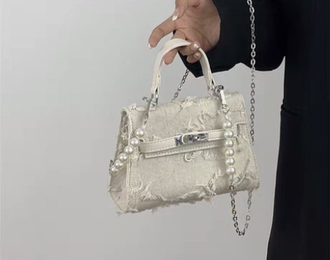 转卖复古牛仔布乞丐凯莉单肩包包女2022新...