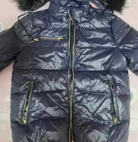 热风里499还是599买的羽绒服。颜色是藏...