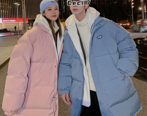 冬季热销韩版潮情侣羽绒服假两件拼接中长款加...