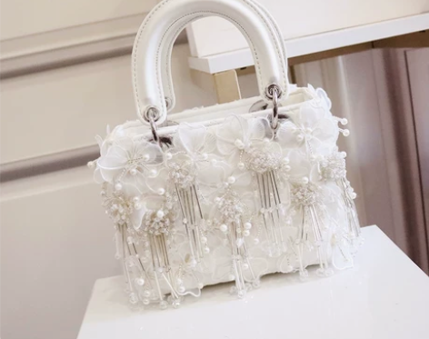 单肩包手提手提洋气仙女流苏花朵包包2022...