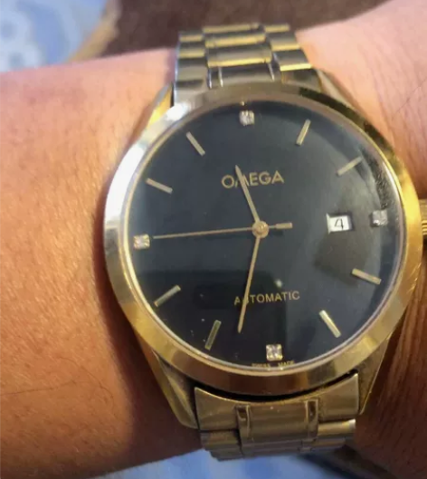 欧美佳机械手表，对时时，不小心把拧轴揪出，...