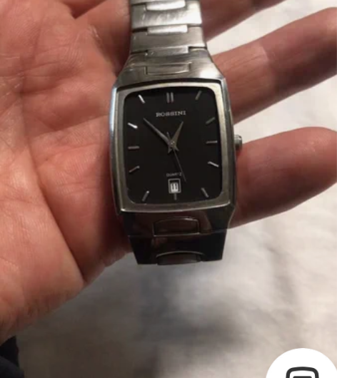 收到一块全钢的罗西尼石英手表.没有电池.不...