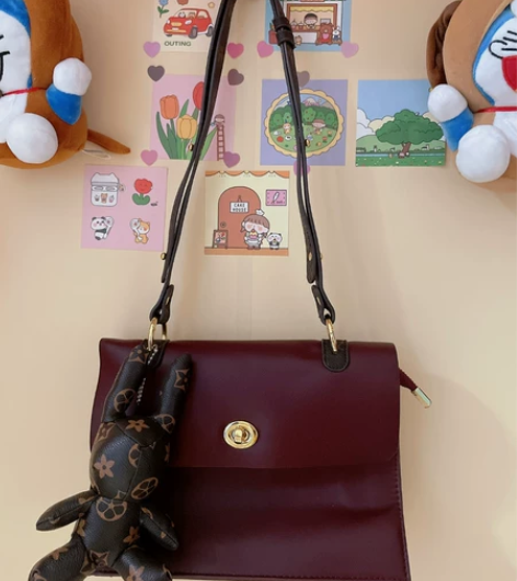 全新真皮公仔宝宝，容量大，隔层多 感兴趣的...