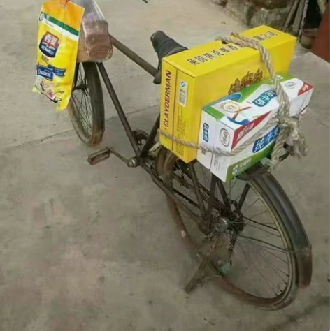 家里二八大杠，今年骑着去看亲戚家，买了点牛...