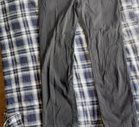 南极人黑色休闲裤。31码的，就是大概82公...