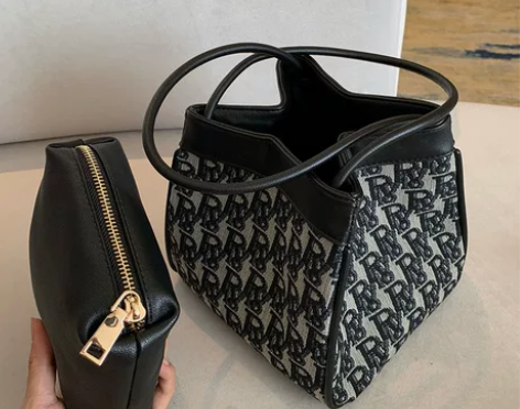 ?小红书超火搭配师小众设计黑白提花腋下包棍...