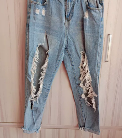 破洞牛仔裤几乎全新XL码九分裤，腰围80c...