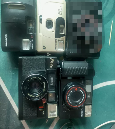 奥林巴斯，佳能，富士傻瓜相机 都是有毛病的...