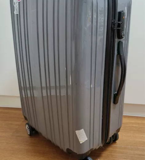 24寸拉杆行李箱，三位TSA密码锁，四个万...