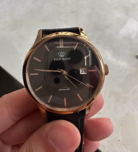 黑金天王机械手表原价1500，表带41，皮...